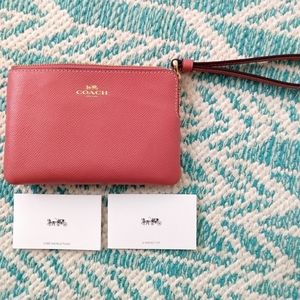 Pink COACH wristlet